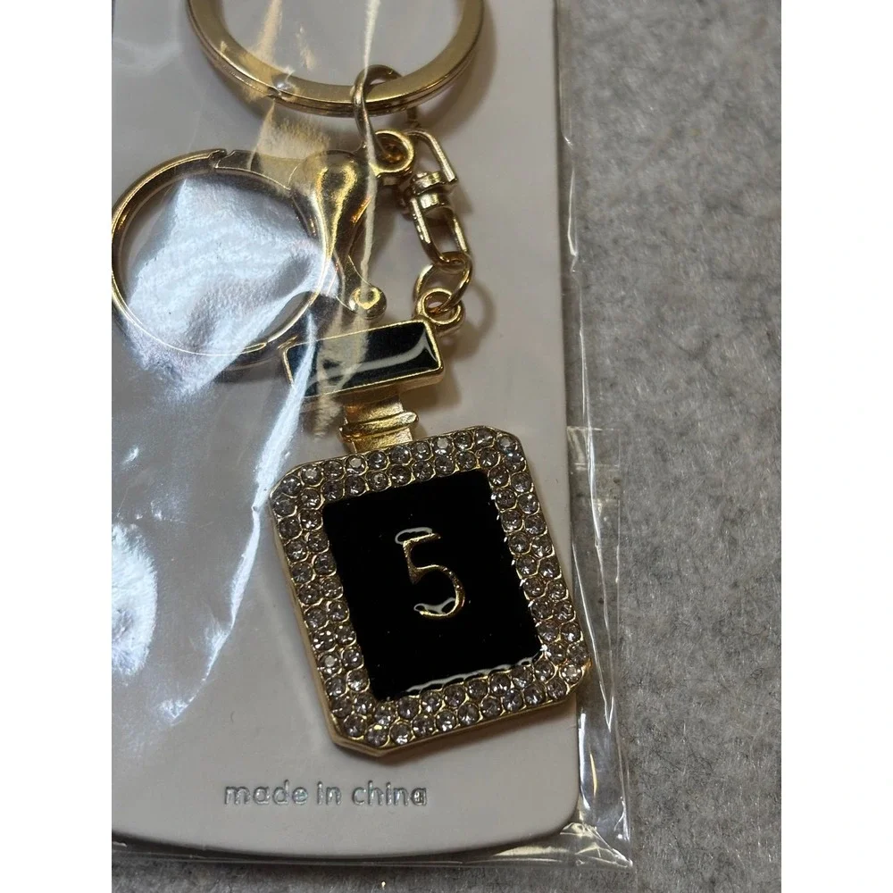 #4. Black Bag Charm Key Chain Perfume-inspired